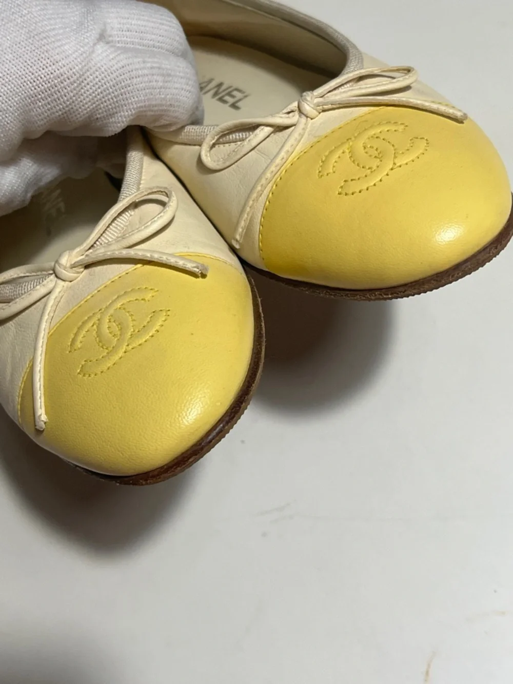 Sold CHANEL Cream Leather Ballet Flats with Yellow Cap Toe - Picture 2 of 11